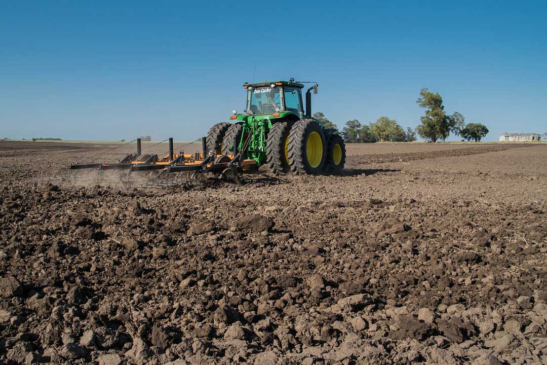 Tractor plowing a field