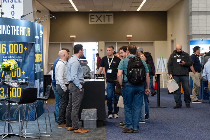 Attendees in the Exhibit Hall 